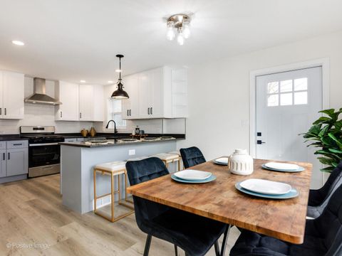 Tiny photo for 1701 N Sayre Avenue, Chicago, IL 60707 (MLS # 12621430)