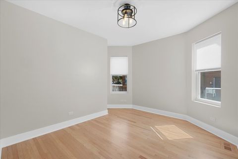 Tiny photo for 2416 W MORSE Avenue, Chicago, IL 60645 (MLS # 12587256)