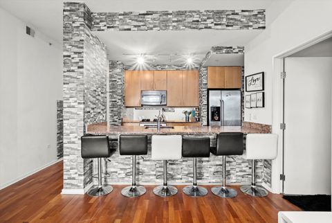 Tiny photo for 9725 Woods Drive #309, Skokie, IL 60077 (MLS # 12452711)