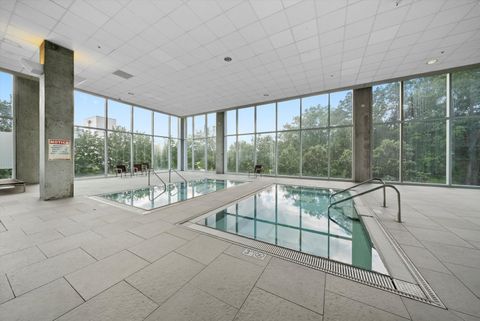 Tiny photo for 9725 Woods Drive #309, Skokie, IL 60077 (MLS # 12452711)