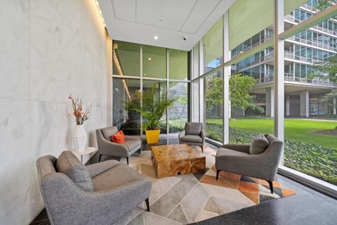 Tiny photo for 9725 Woods Drive #309, Skokie, IL 60077 (MLS # 12452711)