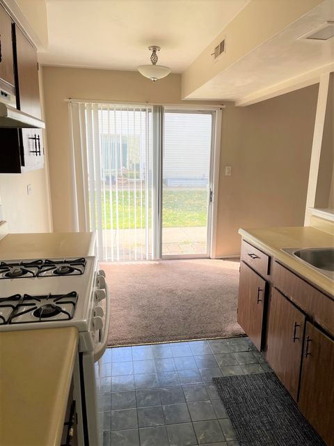 Tiny photo for 334 Joan Court #B, Bartlett, IL 60103 (MLS # 12519265)