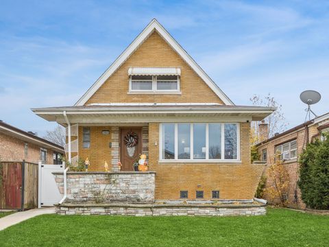 Photo of 3905 W 68TH Place, Chicago, IL 60629 (MLS # 12522454)