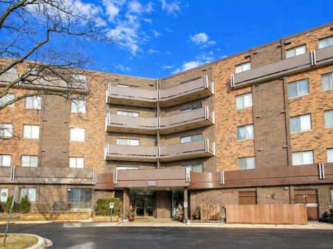 Photo of 850 Wellington Avenue #403, Elk Grove Village, IL 60007 (MLS # 12605565)