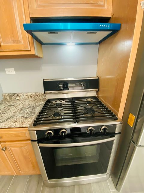 Tiny photo for 10055 Frontage Road #F, Skokie, IL 60077 (MLS # 12452111)