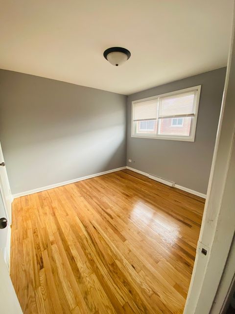 Tiny photo for 10055 Frontage Road #F, Skokie, IL 60077 (MLS # 12452111)
