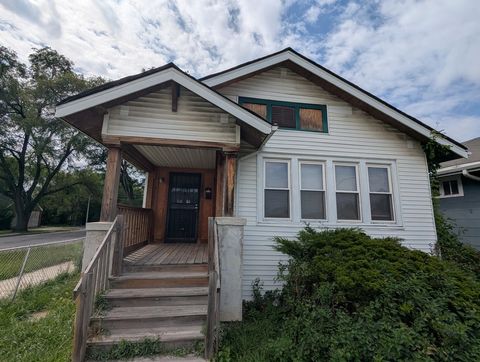 Photo of 10056 S Indiana Avenue, Chicago, IL 60628 (MLS # 12471840)