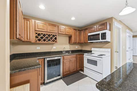 Tiny photo for 103 N Kennicott Avenue, Arlington Heights, IL 60005 (MLS # 12651751)