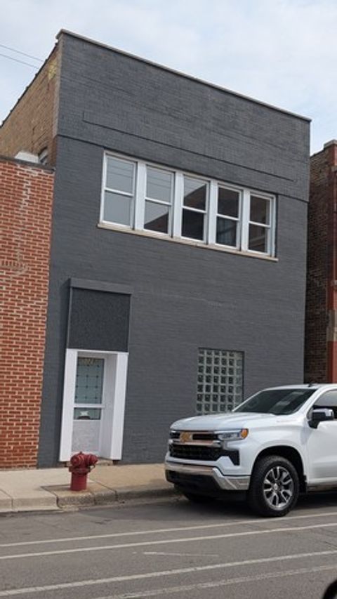 Photo of 5028 W Lawrence Avenue, Chicago, IL 60630 (MLS # 12628032)