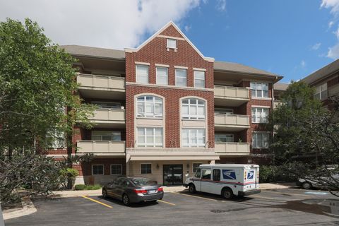 Photo of 77 N Quentin Road #414, Palatine, IL 60067 (MLS # 12455370)