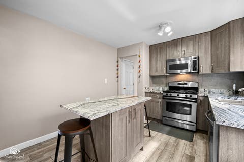 Photo of 6355 W Addison Street #1-SW, Chicago, IL 60634 (MLS # 12733028)