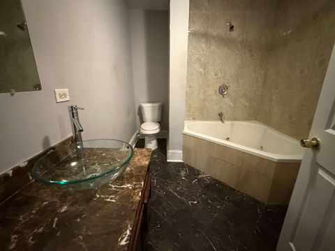 Tiny photo for 46 N Menard Avenue #BG, Chicago, IL 60644 (MLS # 12573176)