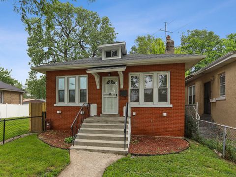 Photo of 8235 S Woodlawn Avenue, Chicago, IL 60619 (MLS # 12626967)