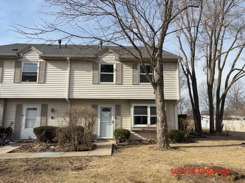 Photo of 10 Fernwood Drive #L, Bolingbrook, IL 60440 (MLS # 12290343)