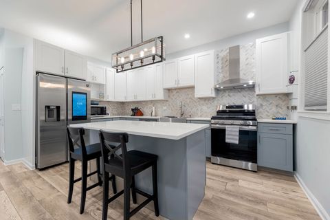 Tiny photo for 7251 S Paxton Avenue, Chicago, IL 60649 (MLS # 12579446)