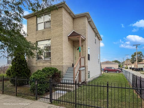 Photo of 259 W 65th Street, Chicago, IL 60621 (MLS # 12717173)