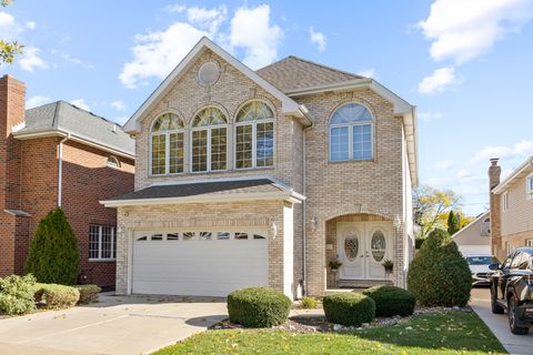 Photo of 5705 S Natoma Avenue, Chicago, IL 60638 (MLS # 12519726)