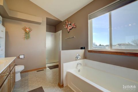 Tiny photo for 220 Carroll Way, Bartlett, IL 60103 (MLS # 12587918)