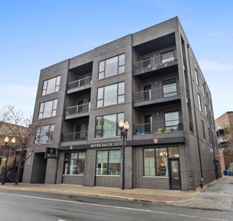 Photo of 2024 W Irving Park Road #302, Chicago, IL 60618 (MLS # 12610444)