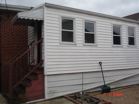 Tiny photo for 6938 W Barry Avenue, Chicago, IL 60634 (MLS # 12390165)