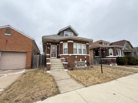 Photo of 322 W 107th Place, Chicago, IL 60628 (MLS # 12573799)