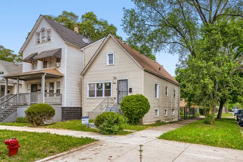 Photo of 12025 S Prairie Avenue, Chicago, IL 60628 (MLS # 12660597)