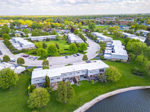 Tiny photo for 670 Versailles Circle #D, Elk Grove Village, IL 60007 (MLS # 12622627)