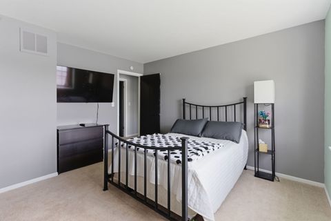 Tiny photo for 670 Versailles Circle #D, Elk Grove Village, IL 60007 (MLS # 12622627)