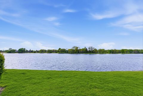 Tiny photo for 670 Versailles Circle #D, Elk Grove Village, IL 60007 (MLS # 12622627)