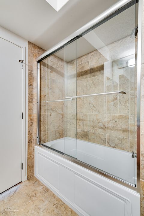 Tiny photo for 9725 Woods Drive #802, Skokie, IL 60077 (MLS # 12439689)