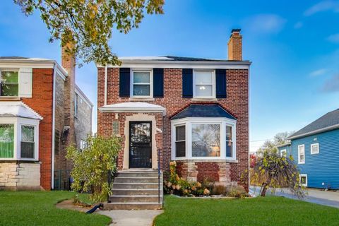 Photo of 5948 W Wilson Avenue, Chicago, IL 60630 (MLS # 12518016)