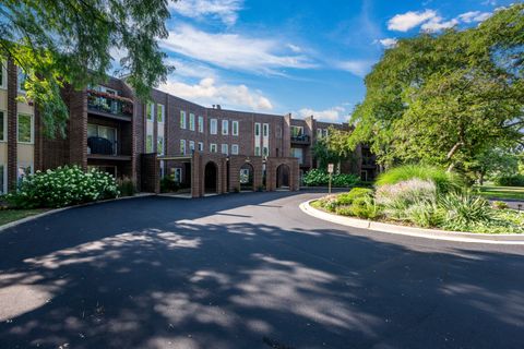 Photo of 1450 Sandpebble Drive #333, Wheeling, IL 60090 (MLS # 12437047)