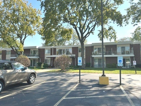 Photo of 127 N Wolf Road #58B, Wheeling, IL 60090 (MLS # 12793674)