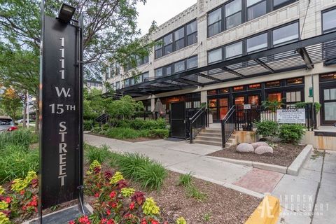 Photo of 1111 W 15th Street #409, Chicago, IL 60608 (MLS # 12590749)