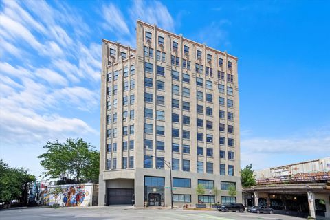 Photo of 1550 S Blue Island Avenue #404, Chicago, IL 60608 (MLS # 12600245)