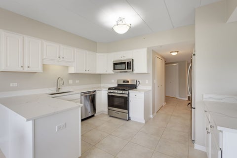 Tiny photo for 8505 Woodward Avenue #202, Woodridge, IL 60517 (MLS # 12791161)