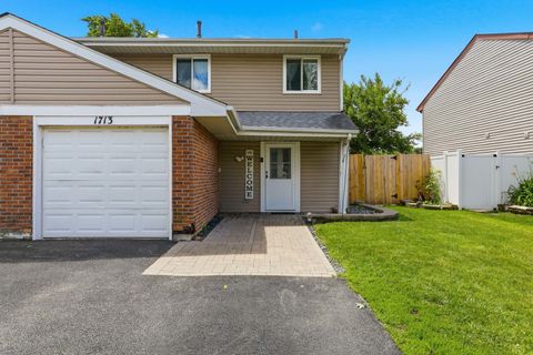 Photo of 1713 Fulton Lane, Hanover Park, IL 60133 (MLS # 12695930)