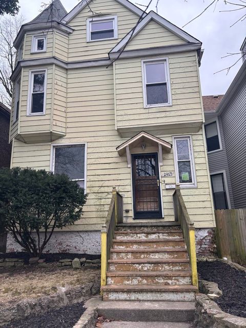 Photo of 2469 E 74th Street, Chicago, IL 60649 (MLS # 12490675)
