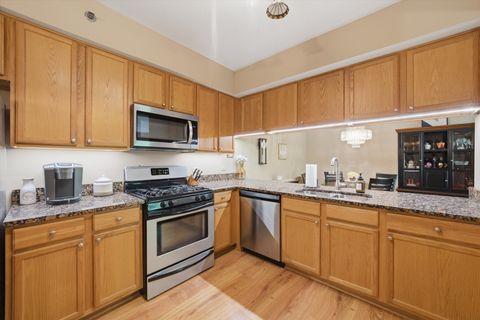 Tiny photo for 7841 W 157th Street #305, Orland Park, IL 60462 (MLS # 12633436)