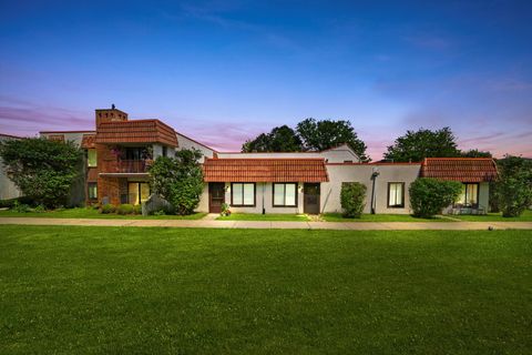 Photo of 743 E Fullerton Avenue #105, Glendale Heights, IL 60139 (MLS # 12606044)