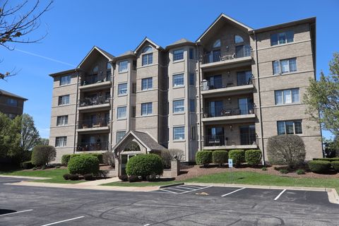 Photo of 14160 SHEFFIELD Drive #404, Homer Glen, IL 60491 (MLS # 12624421)