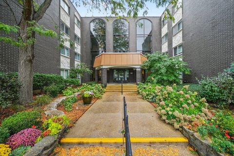 Photo of 9529 Bronx Place #314, Skokie, IL 60077 (MLS # 12497865)