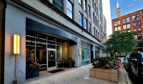 Photo of 565 W Quincy Street #711, Chicago, IL 60661 (MLS # 12491761)