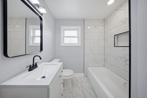 Tiny photo for 15566 Gouwens Lane, South Holland, IL 60473 (MLS # 12601504)