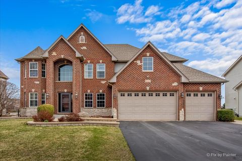 Photo of 647 Bennett Drive, North Aurora, IL 60542 (MLS # 12600392)