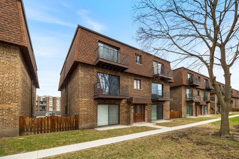 Photo of 9813 BIANCO Terrace #D, Des Plaines, IL 60016 (MLS # 12602415)