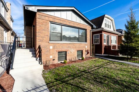 Photo of 1047 N Saint Louis Avenue, Chicago, IL 60651 (MLS # 12602743)
