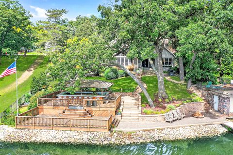 Photo of 5212 W Lake Shore Drive, Wonder Lake, IL 60097 (MLS # 12488588)