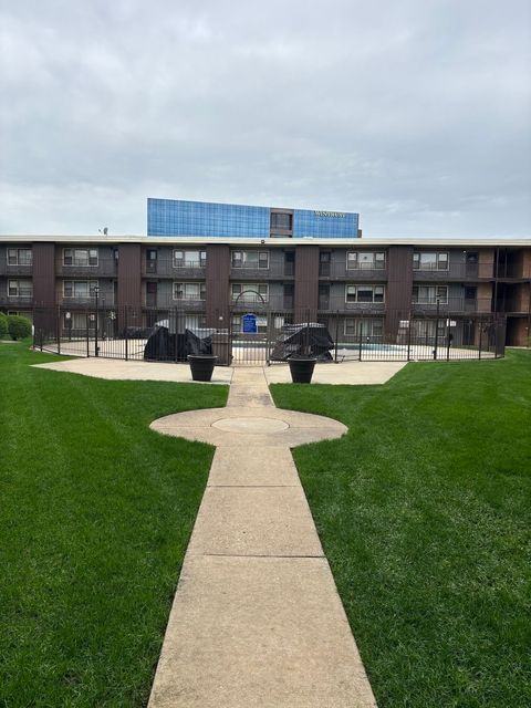 Photo of 9608 W Higgins Road #2c, Rosemont, IL 60018 (MLS # 12618074)