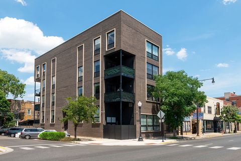 Photo of 3024 W Irving Park Road #1S, Chicago, IL 60618 (MLS # 12559534)